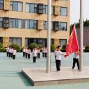 青岛为明学校小学部举行“浓情六月天,感恩父亲节”主题升旗仪式