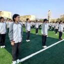 青岛为明学校中小学部举行“回望九月成长，笃行奋战期中”及“红领巾，我的骄傲”主题升旗仪式